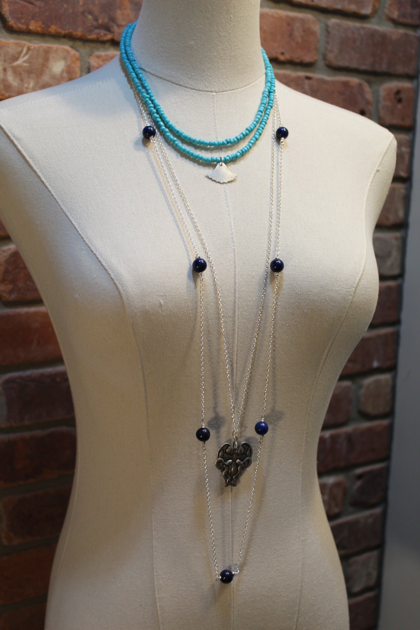 Hand-Struck Silver Egyptian Heart on Silver Rolo Chain