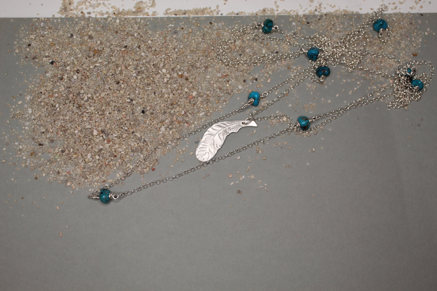 Silver Feather Pendant on Silver Rolo Chain
