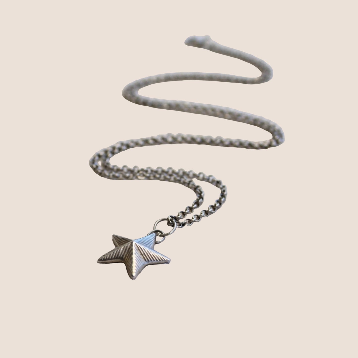 Solid Silver Ridged Star