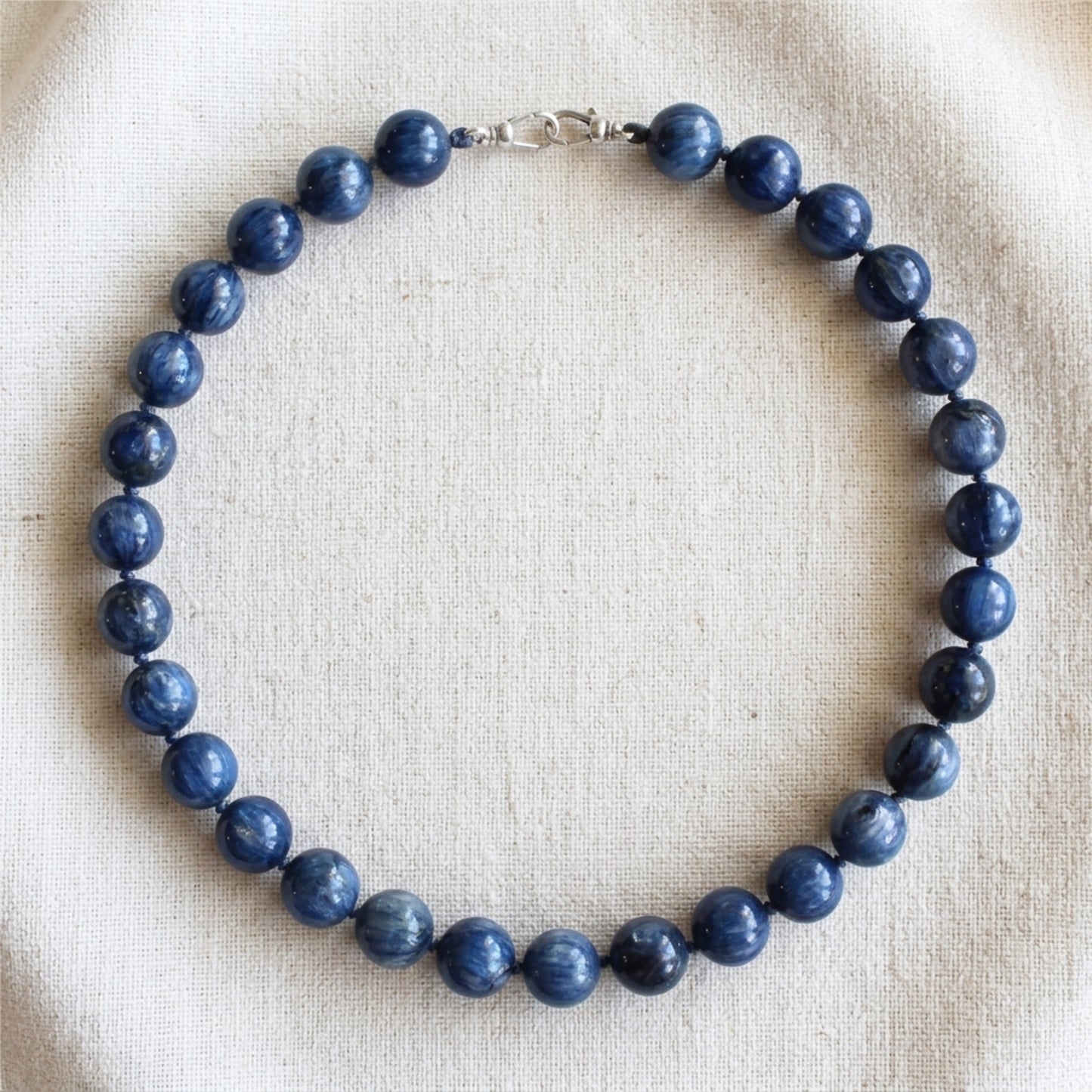 12mm Polished Blue Kyanite Anchor Strand